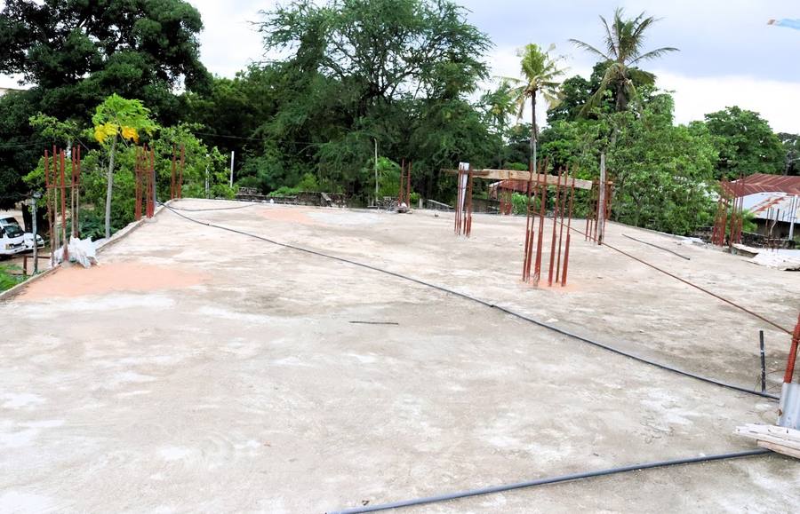GDP Multiplex Center foundation construction — rebar and concrete slab, Mombasa Kenya