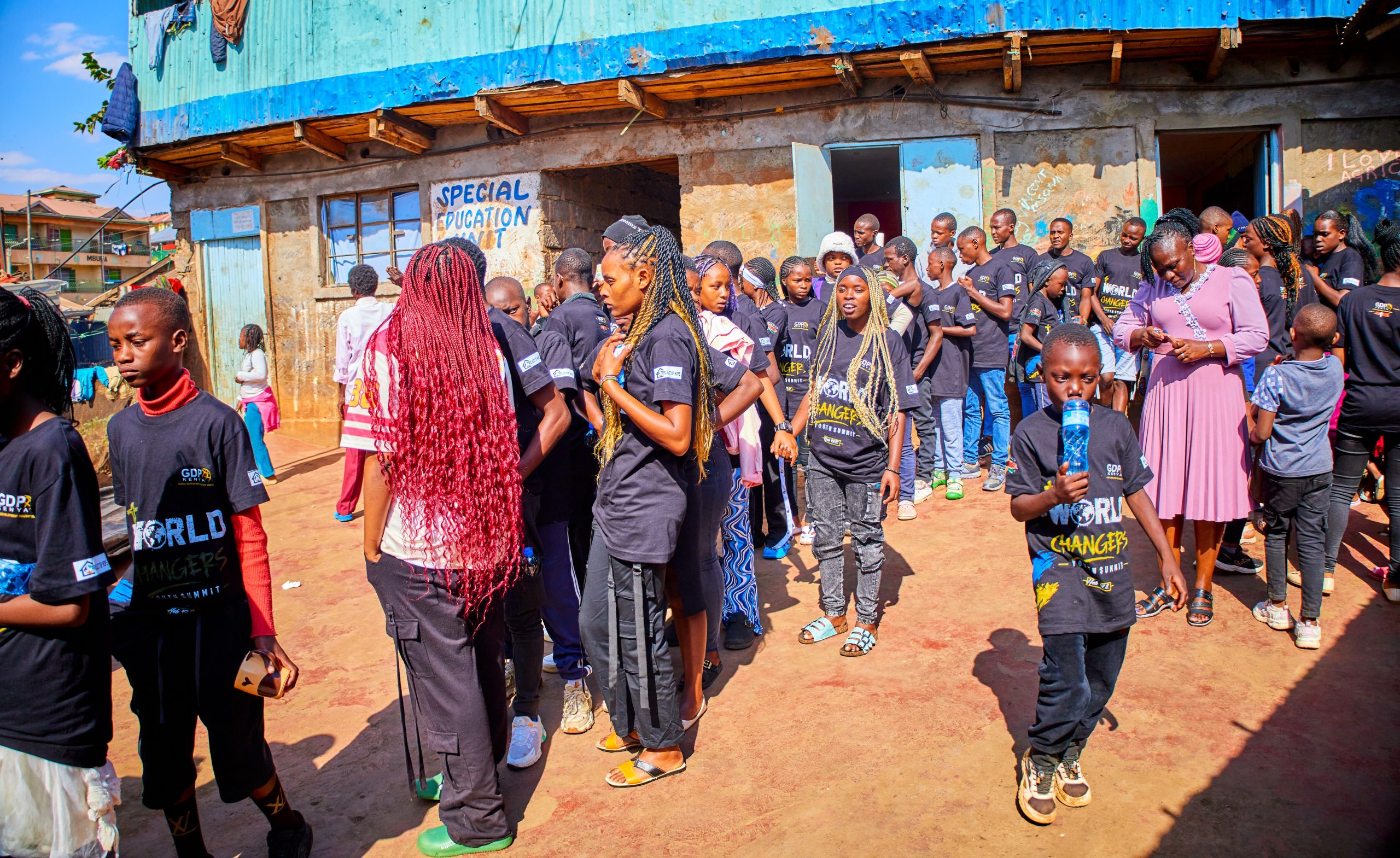 Youth checking in at World Changers Youth Summit registration in Kawangware, Nairobi